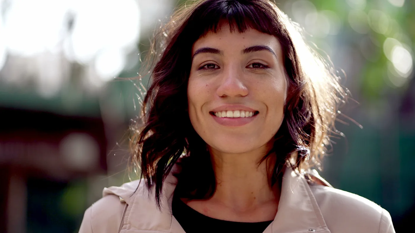Portrait of a smiling woman outdoors